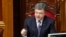 Ukraine's President Petro Poroshenko addresses deputies during a session of parliament in Kyiv, June 19, 2014. 