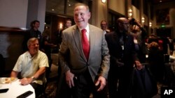 Former Alabama Chief Justice and U.S. Senate candidate Roy Moore, greets supporters before his election party, Sept. 26, 2017, in Montgomery, Alabama. 