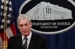 FILE - Then-special counsel Robert Mueller makes a statement on his investigation into Russian interference in the 2016 U.S. presidential election at the Justice Department in Washington, May 29, 2019.