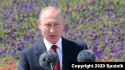 Russian President Vladimir Putin speaks during a ceremony of handing Gold Stars medals to heroes of labor marking the Day of Russia holiday in Moscow, Russia, June 12, 2020.