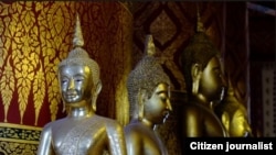 ພະພຸດທະຮູບເກົ່າແກ່ ທີ່ປະດິດສະຖານ ຢູ່ທີ່ວັດແຫ່ງນຶ່ງ ໃນແຂວງຫລວງພະບາງ.