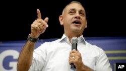 FILE - Gil Cisneros, the Democratic candidate for the U.S. House seat in California's 39th District, speaks during a campaign stop in Buena Park, Calif., Nov. 5, 2018. Cisneros won the seat Saturday.