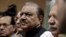 Mamnoon Hussain, presidential candidate of the Pakistan Muslim League-Nawaz (PML-N) party, stands as he submits his nomination papers for the upcoming presidential election at the High Court in Islamabad, July 24, 2013. 