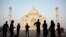 Tourists visit India's famed monument of love, the Taj Mahal, in Agra, India. The 17th century white marble monument is India's biggest tourist draw, with about 3 million visiting every year.