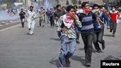 زده کوونکي د احتجاجي مظاهرې په مهال 