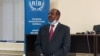 FILE - Paul Rusesabagina, the man who was hailed a hero in a Hollywood movie about Rwanda's 1994 genocide is paraded in handcuffs in front of media at the headquarters of Rwanda's Investigation Bureau, in Kigali, Aug. 31, 2020.