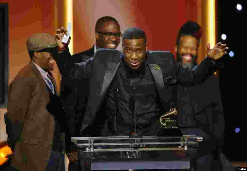 The Robert Glasper Experiment accept their award for best R&B Album for their album "Black Radio" at the 55th annual Grammy Awards in Los Angeles, California, February 10, 2013. REUTERS/Mike Blake (UNITED STATES - Tags: ENTERTAINMENT) (GRAMMYS-SHOW) -