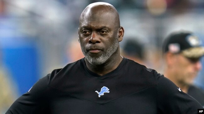 FILE - Detroit Lions offensive coordinator Anthony Lynn watches during warmups before an NFL football game against the Philadelphia Eagles in Detroit, Oct. 31, 2021.