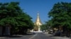 FILE - An empty street is pictured near Shwedagon Pagoda, on Dec. 10, 2021, as demonstrators called for a 'silent strike' in protest against the military coup, in Yangon, Myanmar.