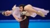 Madison Hubbell and Zachary Donohue of the United States perform their routine in the ice dance competition during the figure skating at the 2022 Winter Olympics, Feb. 14, 2022, in Beijing.
