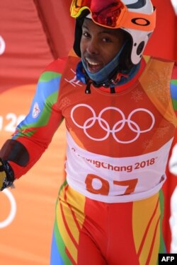 Eritrea's Shannon-Ogbanai Abeda reacts after competing in the Men's Giant Slalom at the Jeongseon Alpine Center during the 2018 Winter Olympic Games in Pyeongchang on Feb. 18, 2018.