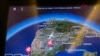 FILE - The flight path of flight AF995 is displayed on a passenger's screen as the plane flies over Botswana on its way to Paris from Johannesburg Monday Dec. 21, 2020.