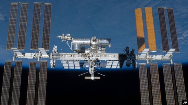 An undated photo provided by NASA shows the International Space Station in orbit. (NASA via AP)