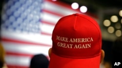 FILE - Supporters of Republican presidential candidate Donald Trump wait for the start of a rally in Westfield, Ind., July 12, 2016. 