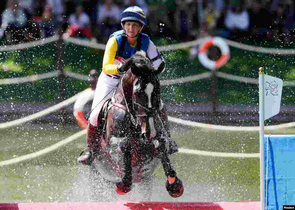 Sweden's Linda Algotsson rides La Fair as she competes in the Eventing Cross Country equestrian event in Greenwich Park.