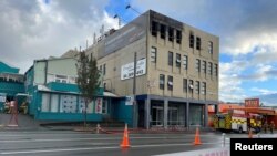 The exterior of a hostel, after a fire ripped through the building, resulting in a number of deaths, in Wellington, New Zealand May, 16, 2023. 