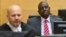 Kenya's Deputy President William Ruto (R) reacts as he sits in the courtroom before his trial at the International Criminal Court (ICC) in The Hague, Sept. 10, 2013.