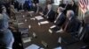 U.S. Vice President Joe Biden, center, meets with sportsmen, wildlife groups, and members of the cabinet, Jan. 10, 2013.