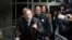 FILE - Harvey Weinstein gestures as he walks by reporters as he leaves a Manhattan courtroom after attending jury selection for his trial on rape and sexual assault charges, Jan. 17, 2020 in New York.