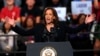 Democratic presidential nominee Vice President Kamala Harris speaks during a campaign rally at the Dort Financial Center in Flint, Michigan, Oct. 4, 2024. 