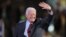FILE - Former President Jimmy Carter waves to the crowd at the Democratic National Convention 2008 at the Pepsi Center in Denver, Colorado, Aug. 25, 2008. Carter died at the age of 100 on Dec. 24, 2024.