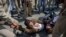 Indian policemen detain Kashmiri Shiite Muslims for participating in a religious procession in central Srinagar, Indian controlled Kashmir, Wednesday, Sept. 19, 2018.