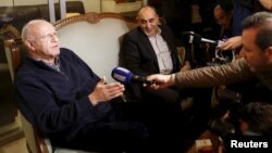 FILE - Former Lebanese information minister Michel Samaha speaks to the media at his home in Beirut, Lebanon, Jan. 14, 2016. The Military Appeals Court has sentenced him to 13 years in jail on terrorism charges.