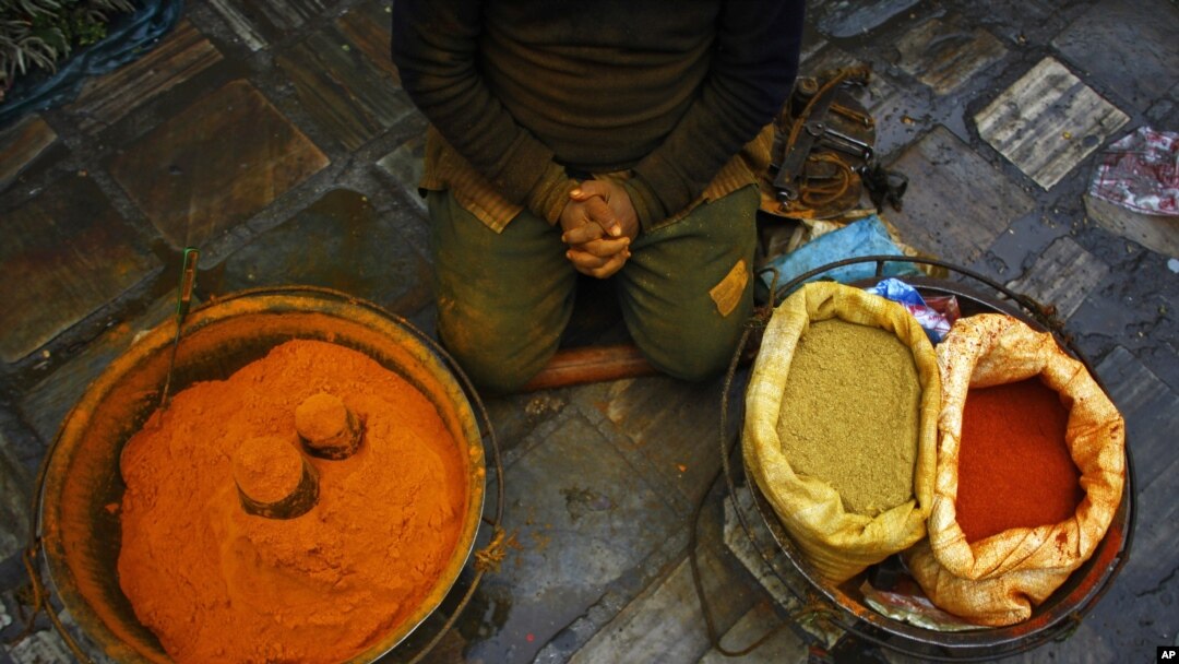 A Nepalese spice vendor waits for customers at Ason market in Katmandu, Nepal, Tuesday, Feb. 5, 2013. Ason is one the busiest and oldest market in Katmandu. (AP Photo/Niranjan Shrestha)