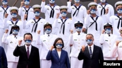 Taiwan President Tsai Ing-wen takes a group photo at a delivery ceremony for the Navy's Yushan amphibious landing dock in Kaohsiung