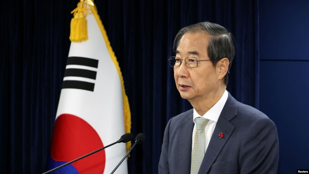 Acting South Korean President and Prime Minister Han Duck-soo delivers an address to the nation at the government complex in Seoul, South Korea, on Dec. 14, 2024.