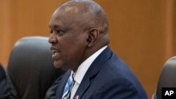 President of Botswana Mokgweetsi Masisi talks to China's President Xi Jinping (not pictured) during their bilateral meeting at the Great Hall of the People in Beijing, China, Aug. 31, 2018. 