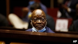 FILE — Former South African President Jacob Zuma, sits in the High Court in South Africa, May 26, 2021, at his corruption trial. Judgement handed down June 29, 2021 found Zuma guilty of contempt of court, and sentenced him to 15 months imprisonment.