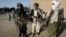 FILE - Taliban soldiers in Afghanistan