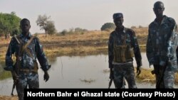 Police officers patrol in Kiir Adem in South Sudan, where six policemen were killed at the weekend in a raid blamed on nomads from Sudan. (Courtesy)