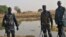 Police officers patrol in Kiir Adem in South Sudan, where six policemen were killed at the weekend in a raid blamed on nomads from Sudan. (Courtesy)