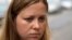 Russian journalist Maria Zholobova enters the police station in Moscow, Russia, June 29, 2021. Russian authorities recently raided homes of several investigative journalists and their family members, amid mounting pressure on Russia's independent media.
