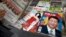 A magazine featuring Chinese President Xi Jinping with the headline "China becomes strong" is placed next to a magazine with popular Chinese actress Fan Bingbing at a news stand in Beijing, China, Oct. 21, 2017.