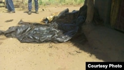 This photo, taken on or about April 12, 2017, shows the remains of a man slain during a raid on the town of Parjok, South Sudan, by men wearing uniforms of the South Sudanese army. Up to 16 people were killed, many of them execution-style.