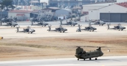 A helicopter prepares to take off at a U.S. army base in Pyeongtaek, South Korea, Feb. 27, 2020.