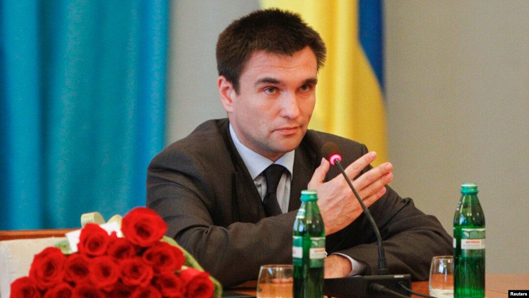 FILE - Ukraine's Foreign Minister Pavlo Klimkin is seen gesturing following his appointment at the Ministry of Foreign Affairs in Kyiv, June 19, 2014.