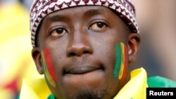 A Senegal fan reacts after Colombia defeated Senegal 1-0 at the world Cup in Samara, Russia, June 28, 2018. Senegal was eliminated while Colombia advanced to the group of 16.