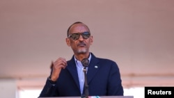 FILE - Rwandan President Paul Kagame speaks during Armed Forces Day celebrations in Pemba, Mozambique, September 25, 2021.