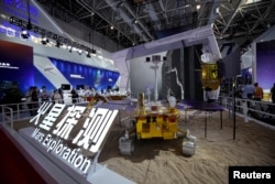 FILE - A model of Chinese Mars rover Zhurong, part of China's Tianwen-1 space mission, is seen displayed at the China International Aviation and Aerospace Exhibition, or Airshow China, in Zhuhai, Guangdong province, China September 28, 2021. (REUTERS/Aly Song/File Photo)