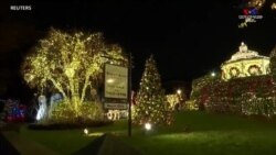 Այցելուները հավաքվել են Նյու Յորքի Սուրբ Ծննդյան տան լույսերի ցուցադրությանը նոր սպասումներով