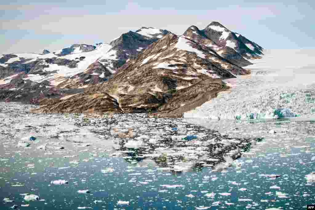 An aerial photo shows icebergs as they float along the eastern cost of Greenland near Kulusuk.
