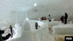 Inside view of igloo cafe with seats covered by sheepskin in Gulmarg. (Bilal Hussain/VOA)