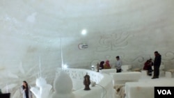 Inside view of igloo cafe with seats covered by sheepskin in Gulmarg. (Bilal Hussain/VOA)