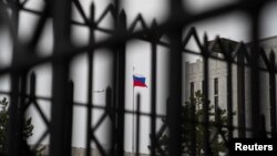The Russian flag flies above the Embassy of the Russian Federation, near the Glover Park neighborhood of Washington, Feb. 22, 2022.