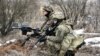 Ukrainian soldiers take part in exercises in an unknown location, Feb. 18, 2022