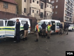 South African police and other state security agents monitoring a #Put South Africans First protest in Hillbrow, Johannesburg, South Africa on Saturday, February 19, 2022. (Photo: Thuso Khumalo)